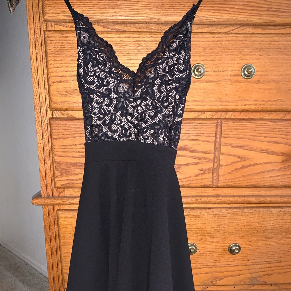 A dress from epiphany, it’s a size small, in colors Black and Tan